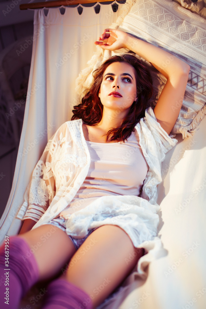 young pretty lady girl in hammock indoor at winter holidays relaxing calm, lifestyle happy people concept young pretty lady girl in hammock indoor at winter holidays relaxing calm, lifestyle happy people concept