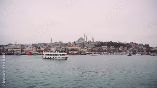 View of the city of Istanbul from a boat floating on the river. It offers a beautiful view of the mosque of Istanbul