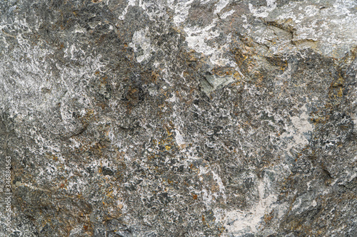 Sulphide copper nickel ore texture close-up. Mineral stone surface background. photo