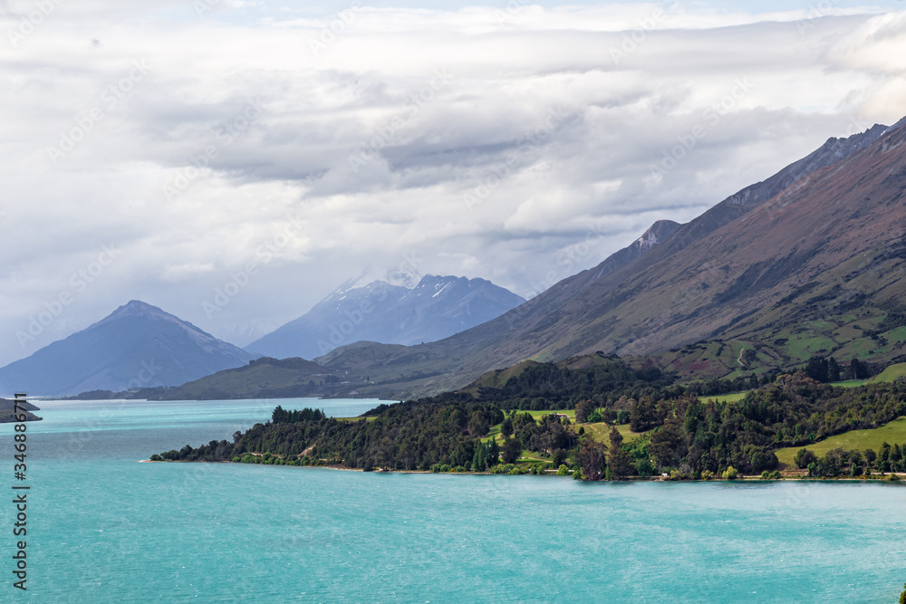 The hilly landscape on the shores of Lake Wakatipu. New Zealand
