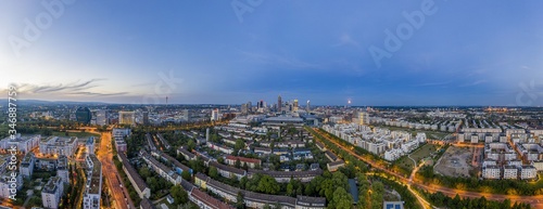 Aerial drone panorama of Frankfurt skyline during sunset from Rebstock park © Aquarius
