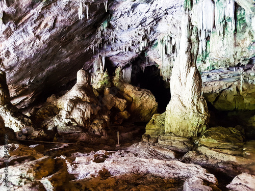Light dropping water drops create chalk limestone inside stalatite cave pai thailand tour chiang mair dark and light
