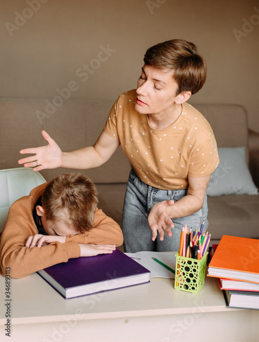 Mother teaches  and scolds child son home online education