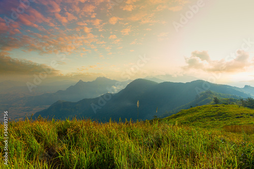 Mountain valley during sunrise. Natural summer landscape © banjongseal324