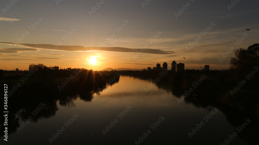 Zagreb`s Sava river in the dying hours of the day, at beautiful sunset