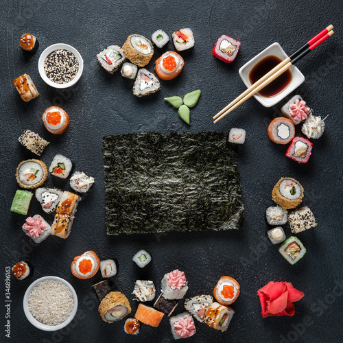 A set of traditional Japanese dishes on a dark background