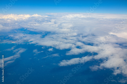 white clouds over the blue sea 