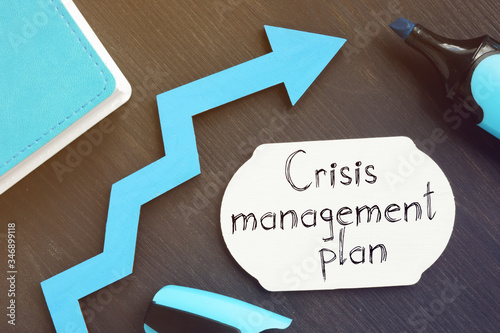 Crisis management plan is shown on the conceptual business photo