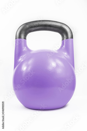 Big traditional cast iron kettlebell painted purple shot straight on in a seamless white studio.