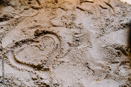 Heart painted on the sand © KoshkinS