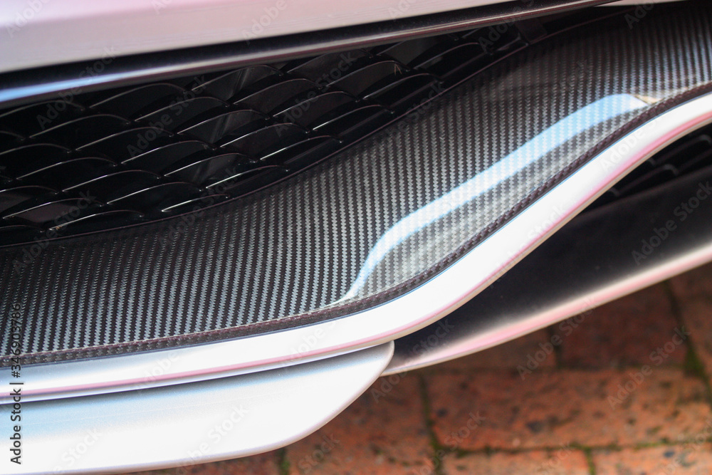 Close up of carbon fiber trim on a car Close up of carbon fiber trim on a car