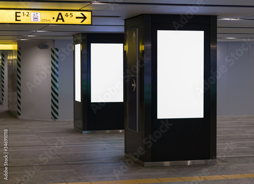 Blank billboards posters in the airport ,Empt White screen at the airport for advertising