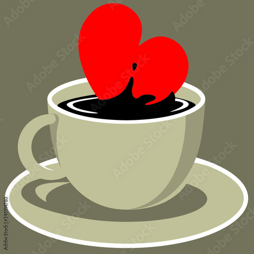 Cup of coffee with a red heart dipped