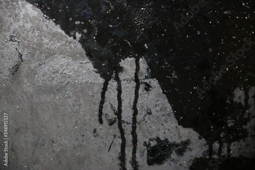 fondo abstracto gris y negro con manchas  y reflejos de luz 