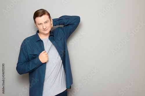 Portrait of happy confident man standing in relaxed position