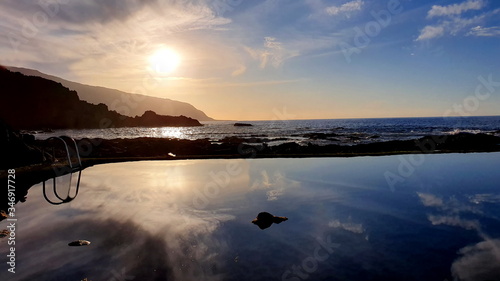spain 
canary islands
islas canarias
iles canaries
el hierro
island
la restinga
landscape
volcano
volcan
travel
earth
sea
ocean
sun
sunny
sand
holidays
magnificent
blue sky
sky
red
brown
blue
