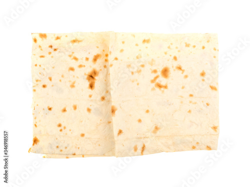 Thin pita bread on a white background, isolated.