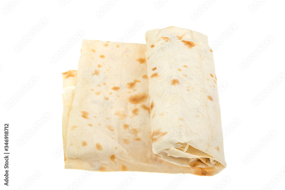 Thin pita bread on a white background, isolated.