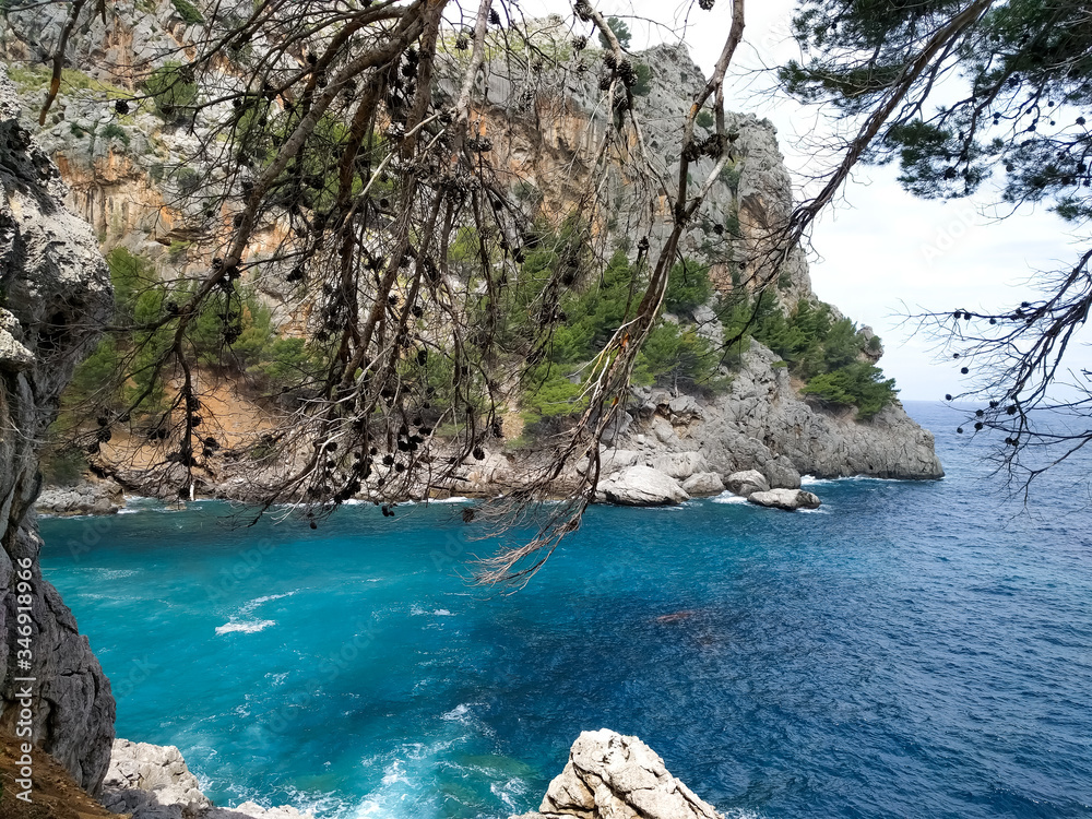 Incredible blue sea on the island of Mallorca. Seascape with cliffs and surrounding nature. Incredible blue sea on the island of Mallorca. Seascape with cliffs and surrounding nature.