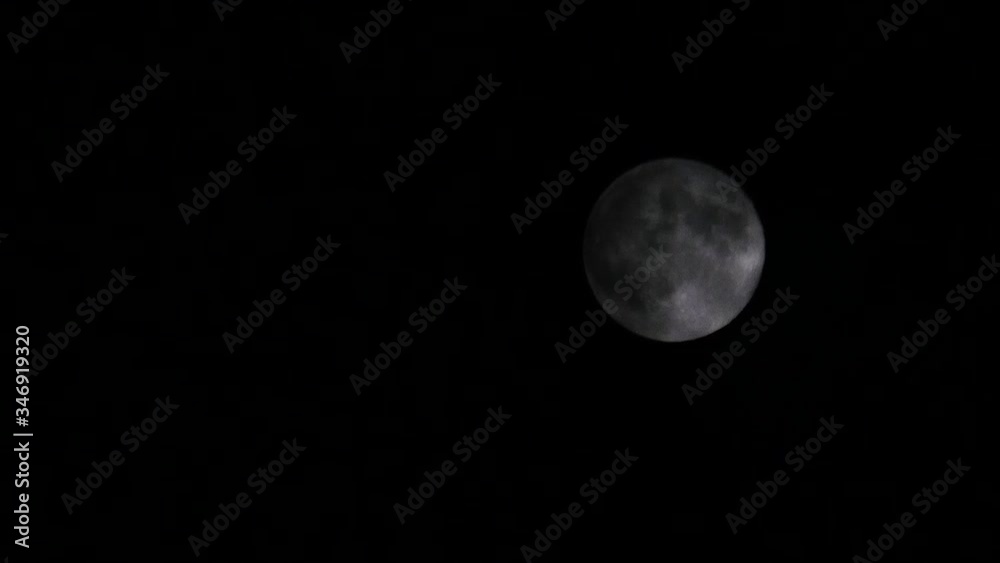Dense clouds cover the moon. Horror moon with dark clouds Dense clouds cover the moon. Horror moon with dark clouds