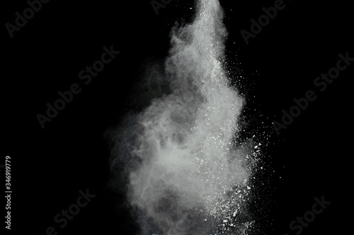 Fototapeta Naklejka Na Ścianę i Meble -  White powder explosion isolated on black background.