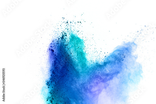 Freeze motion of colored powder explosions isolated on white background.