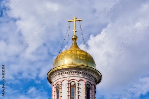 Domes of the temple against a cloudy sky in Moscow photo