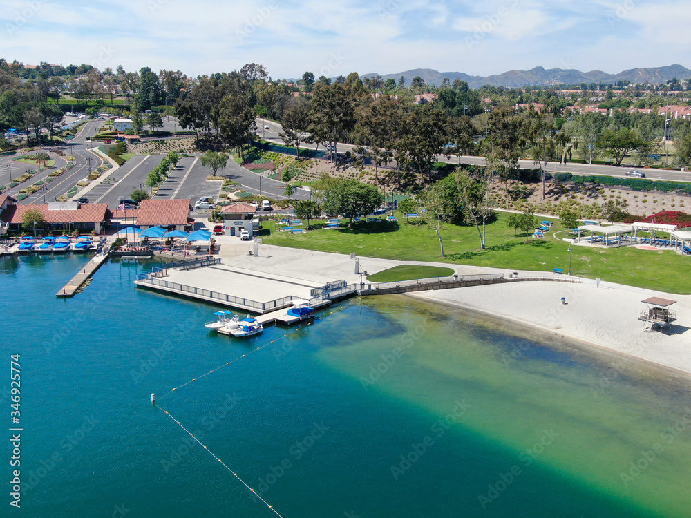 Aerial view of Lake Mission Viejo, with recreational facilities and beach Playa Del Norte. Orange County, California, USA