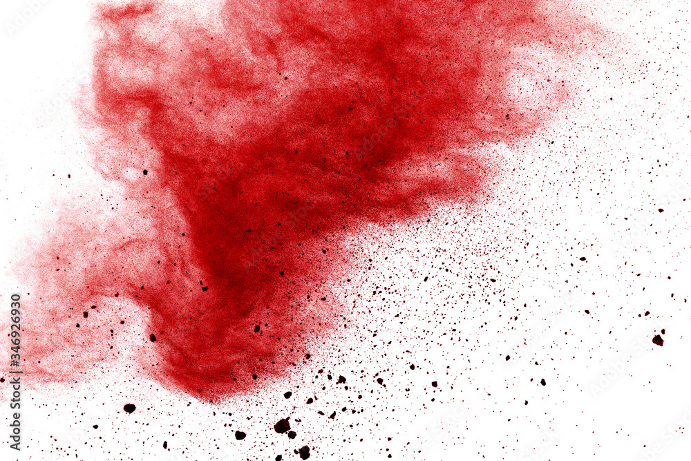 Red powder explosion on white background. Colored cloud. Colorful dust explode. Paint Holi.