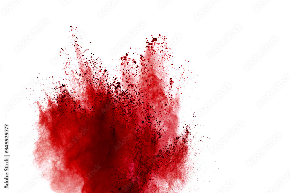 Red powder explosion on white background. Colored cloud. Colorful dust explode. Paint Holi.