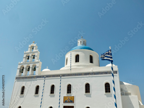 White Church with bells and blue dome at Oia, Santorini, Greek Islands © Rosana