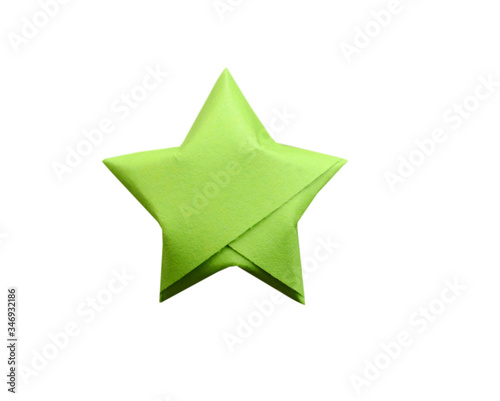 Green origami lucky star isolated white