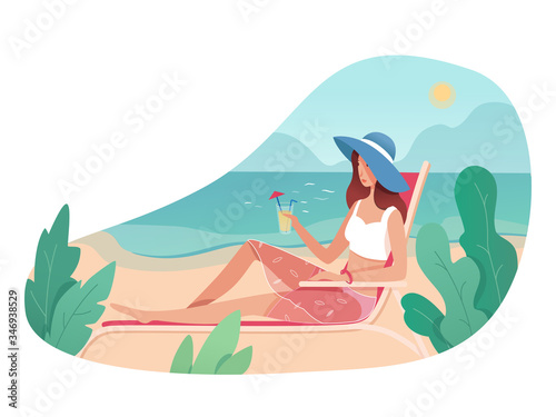Pretty woman drinking cocktail rest on deck chair