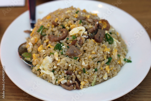 Fried brown rice with beef and vegetables in Din Tai Fung restaurant of Mall of the Emirates in Dubai UAE, December 2019. Healthy, delicious and fresh asian food offering good value for money.