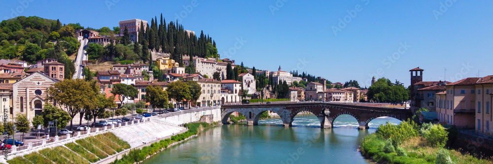 Ponte Pietra, Verona, with hill and river, Verona City, aereal