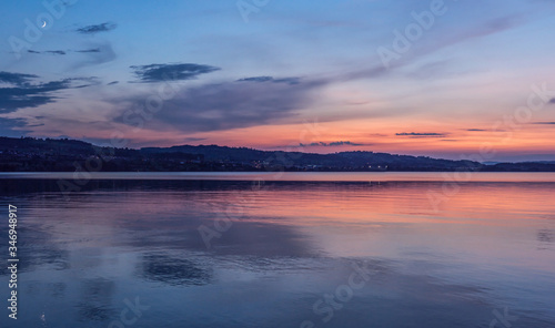staggering sunset shot of lake sempach in summer canton lucerne