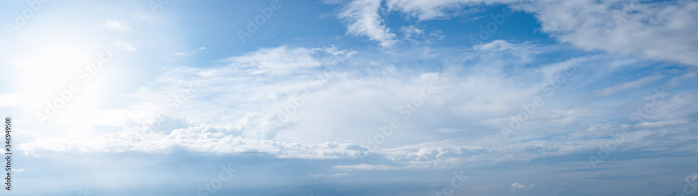 Blue sky with clouds and sun panoramic web banner Blue sky with clouds and sun panoramic web banner