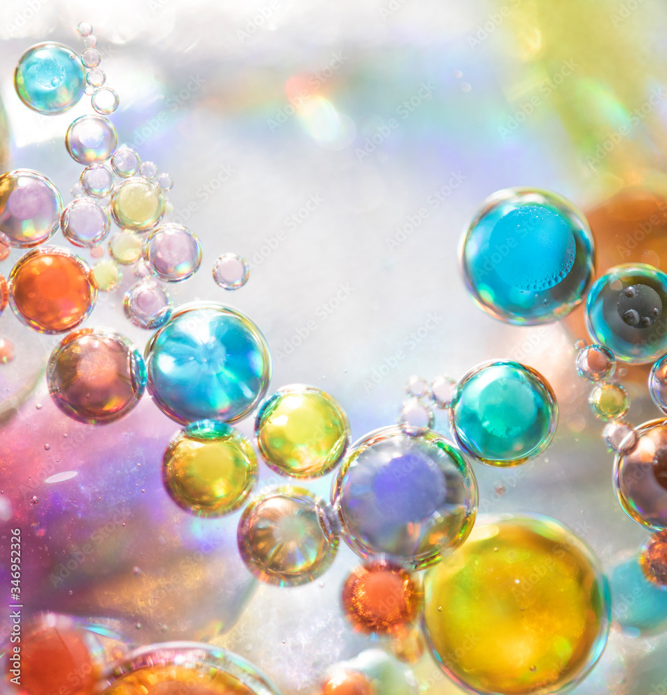 Planet Looking Bubbles of Coloured Water on Oil Fantasy Background