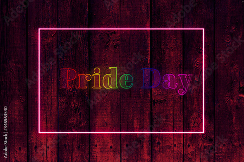 LGBT Pride day text in fluorescent frame.