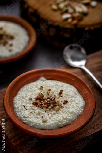 Phirni, a traditional and delicious indian style milk and rice based creamy dessert, served in clay pot