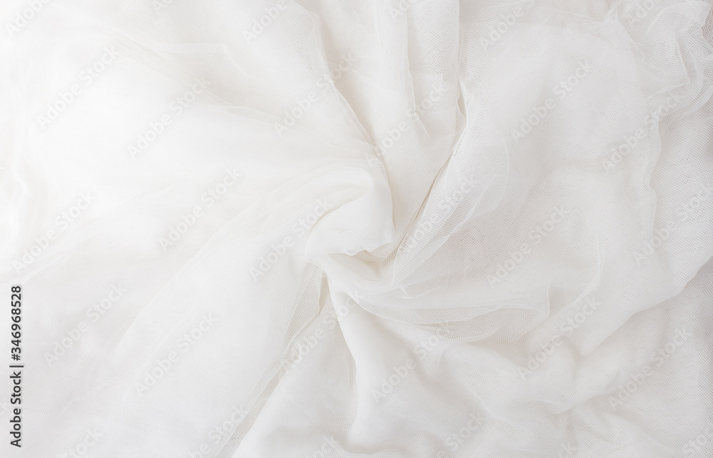 Top view White crumpled tulle and grapefruit, contemporary art in pastel colors. Still life with shadow and sunbeams Top view White crumpled tulle and grapefruit, contemporary art in pastel colors. Still life with shadow and sunbeams