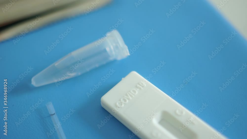 Unpacked kit of rapid test covid-19 - test cassette, pipette, reagent flask tube and scarifier. Diagnosis of coronovirus sars-cov-2 Unpacked kit of rapid test covid-19 - test cassette, pipette, reagent flask tube and scarifier. Diagnosis of coronovirus sars-cov-2