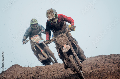 Motocross drivers during motocross race photo