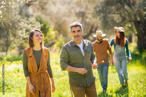 Group of friends walking in the countryside