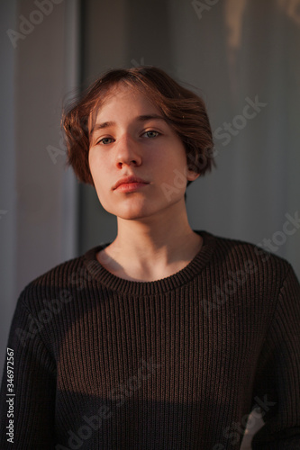 Pretty young man in sunlight  photo