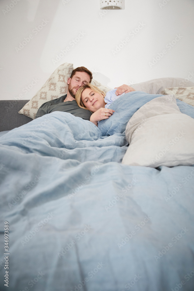 Couple sleeping in bed Couple sleeping in bed