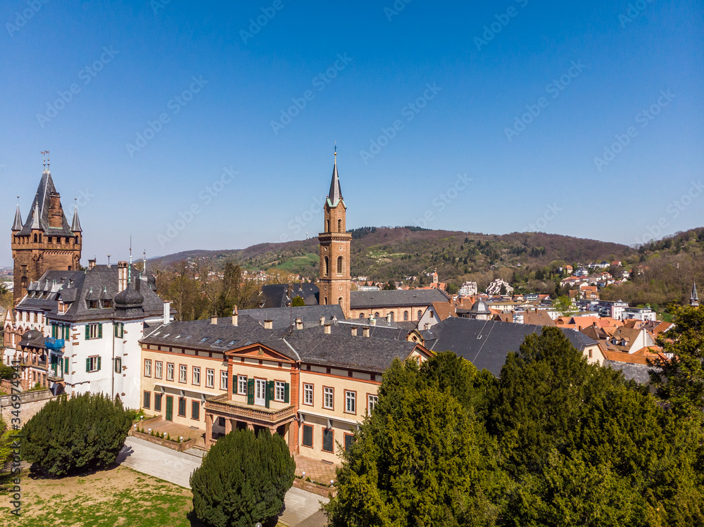 Beautiful top view of the Weinheim castle. The former castle and palace of the rulers of Kurpfalz. Blue sky and mountains in the background. Weinheim. Germany. Beautiful top view of the Weinheim castle. The former castle and palace of the rulers of Kurpfalz. Blue sky and mountains in the background. Weinheim. Germany.