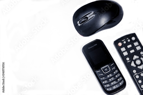 Phone and mouse on a white background