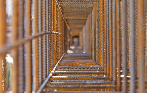 Inside metal armature carcass. Rebar for concrete construction work