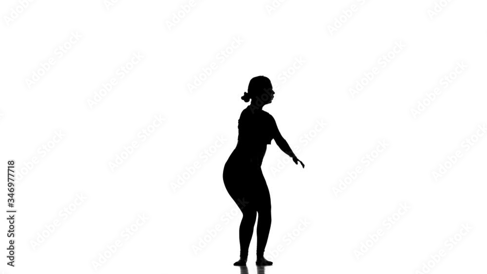 black silhouette on a white background, young beautiful girl dancer dancing contemporary, modern ballet dance, slow motion black silhouette on a white background, young beautiful girl dancer dancing contemporary, modern ballet dance, slow motion